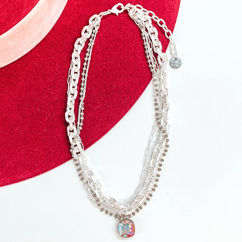 women’s charm bangles-Pink Panache | Four Strand Crystal and Silver Chain Necklace with AB Cushion Cut Crystal Drop