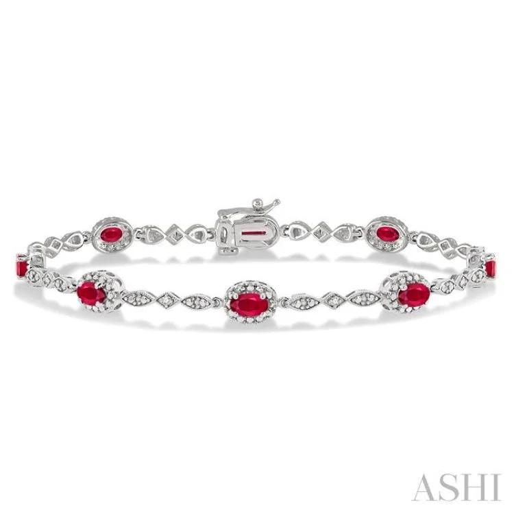 women’s bold bangles-5x3MM Oval Cut Ruby and 1/20 Ctw Single Cut Diamond Bracelet in 14K White Gold