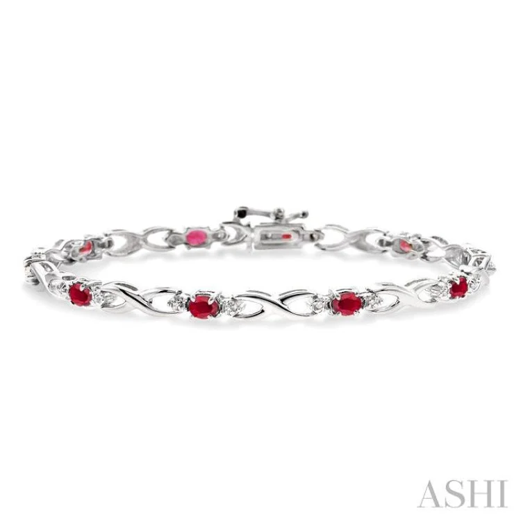 women’s simple bangles-4x3mm Oval Cut Ruby and 1/10 Ctw Single Cut Diamond Bracelet in 10K White Gold