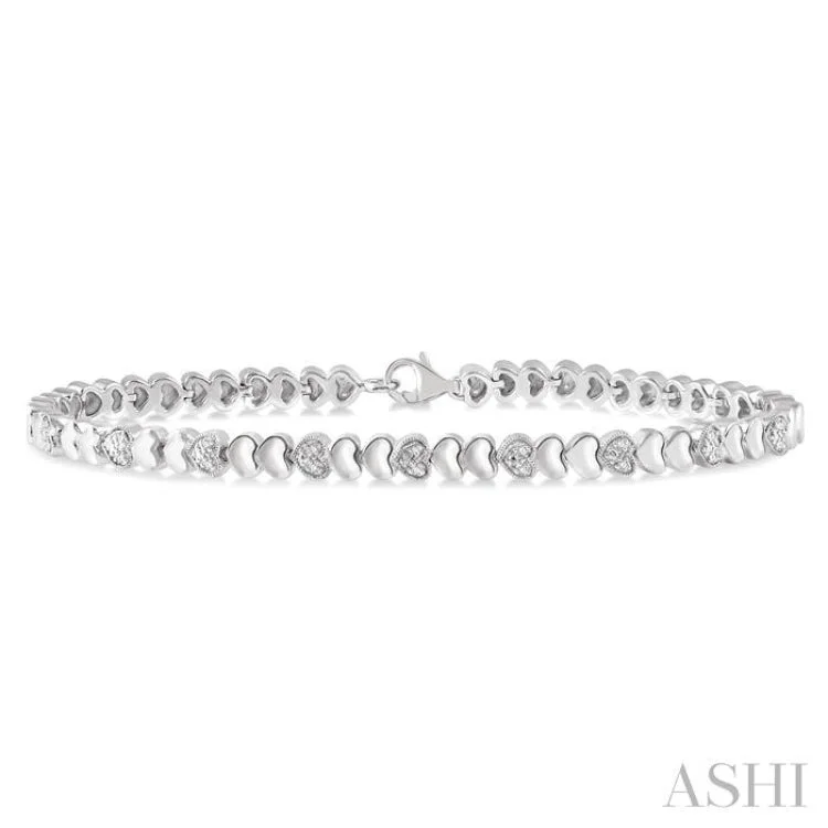 women’s matching bangles-1/6 Ctw Puffed Heart Plain and Round Cut Diamond Fashion Bracelet in Sterling Silver