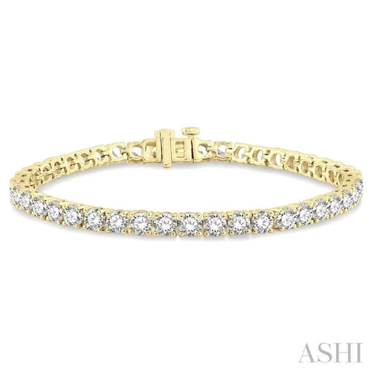 women’s diamond bangles-9 Ctw Round Cut Diamond Tennis Bracelet in 14K Yellow Gold