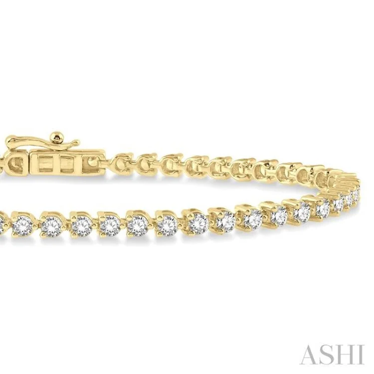 women’s engraved bracelets-2 Ctw Tri-Prong Round Cut Diamond Bracelet in 14K Yellow Gold