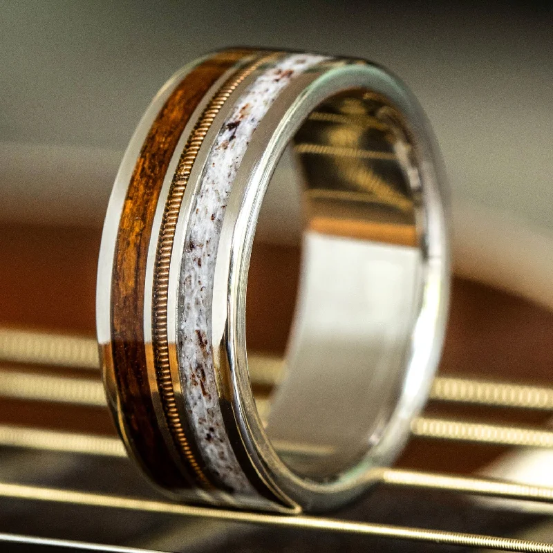 women’s matching engagement rings-The Pioneer | Men's Gold Wedding Band with Guitar String, Elk Antler & USS North Carolina Battleship Teak Wood