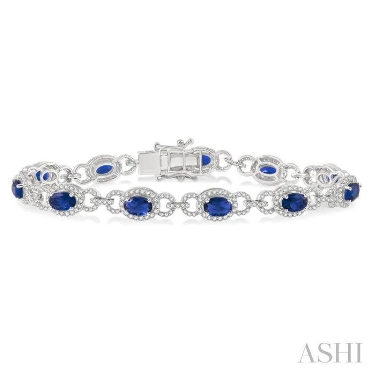 women’s adjustable bangles-1 3/4 Ctw Round Cut Diamond & 6x4MM Oval Cut Sapphire Precious Bracelet in 14K White Gold